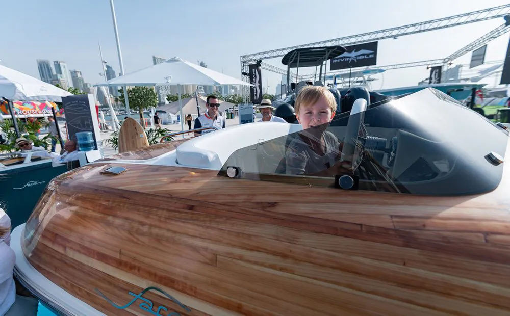 Children enjoying interactive marine-themed activities at the Dubai International Boat Show