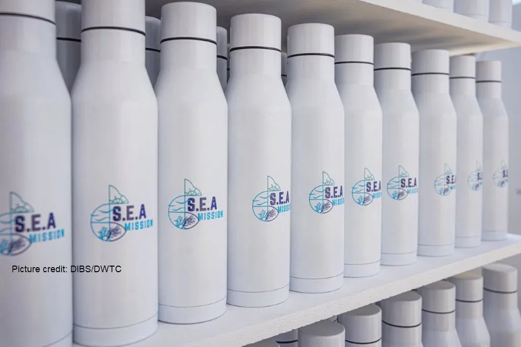 Reusable water bottles from the S.E.A. Mission sustainability initiative.
